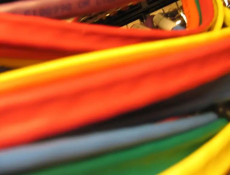 Rows of network equipment in a data center server room