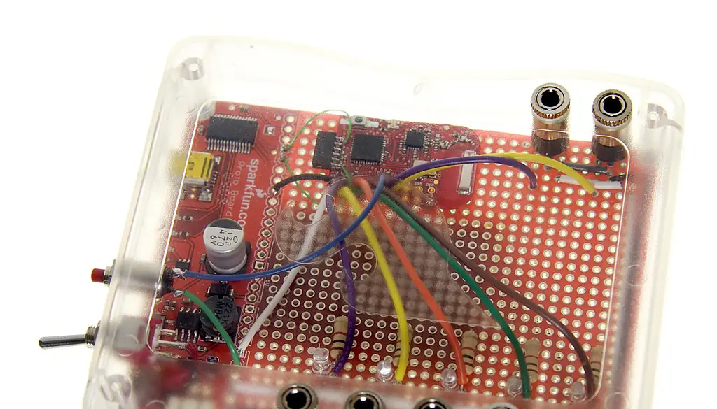 Close-up of a USB-C charging port on a smartphone being inspected