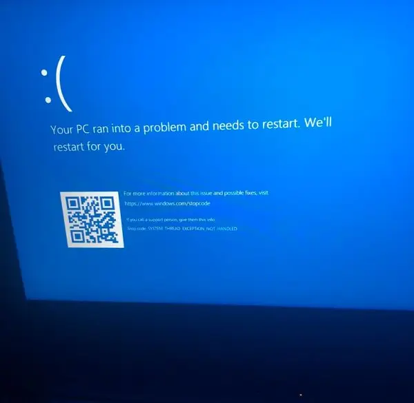 A laptop showing a recovery command prompt
