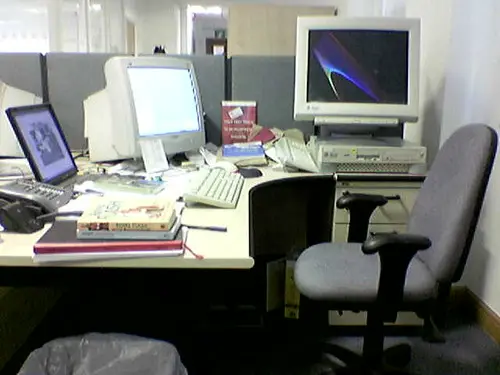 A Windows laptop showing an elevated Command Prompt running a DISM command